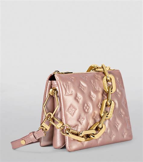 rose gold louis vuitton bag.